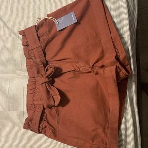 Cute orange ruffle tie shorts